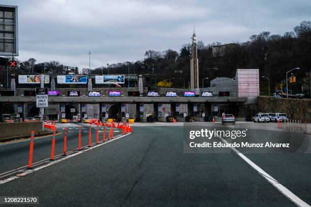 People commute from New Jersey to New York through the Lincoln Tunnel on March 25, 2020 in Weehawken, New Jersey. Across the country schools,...