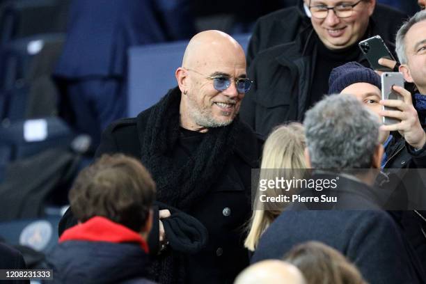 Singer Pascal Obispo attends the Ligue 1 match between Paris Saint-Germain and Girondins Bordeaux at Parc des Princes on February 23, 2020 in Paris,...