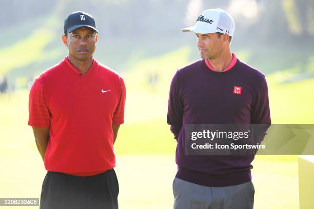 Tiger Woods and Adam Scott look on during the trophy ceremony after the final round of The Genesis Invitational golf tournament at the Riviera...