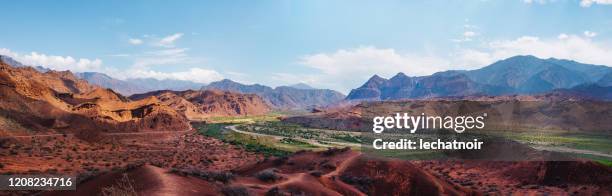 widescreen view on the red mountains of argentina - salta argentina stock pictures, royalty-free photos & images