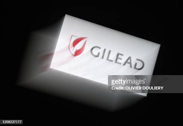 In this photo illustration a Gilead logo is displayed on a smartphone on March 25, 2020 in Arlington, Virginia. - Gilead announced on March 25, 2020...