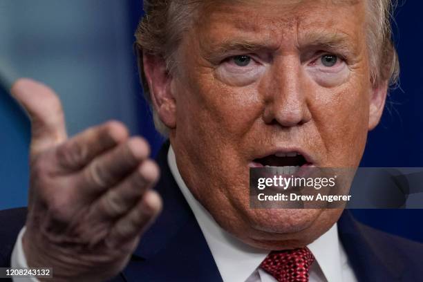 President Donald Trump, joined by members of the Coronavirus Task Force, speaks during a briefing on the coronavirus pandemic, in the press briefing...