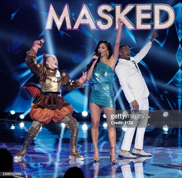 Jo Jo Siwa, Nicole Scherzinger and Nick Cannon in the Old Friends, New Clues: Group C Championships episode of THE MASKED SINGER airing Wednesday,...