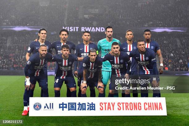 Paris Saint-Germain players pose together as a support for China concerning the coronavirus before the Ligue 1 match between Paris Saint-Germain and...