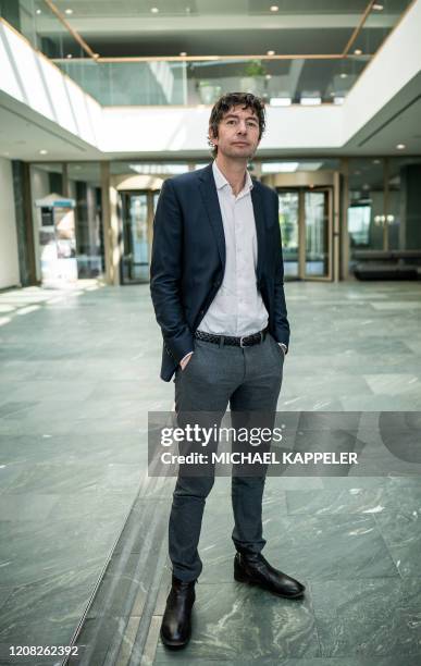 Christian Drosten, director of the Institute of Virology at Berlin's Charite hospital, is pictured after a press conference in Berlin on March 26 to...