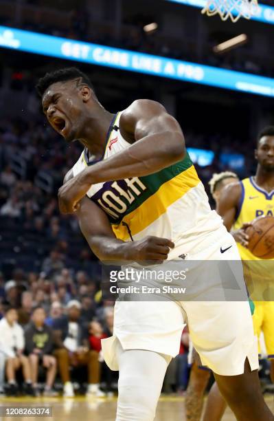 Zion Williamson of the New Orleans Pelicans reacts after he made a basket and was fouled by the Golden State Warriors at Chase Center on February 23,...