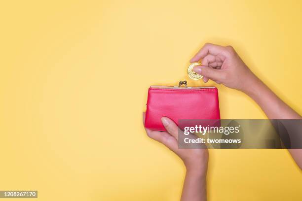 personal financial planning concept still life. - rote handtasche stock-fotos und bilder