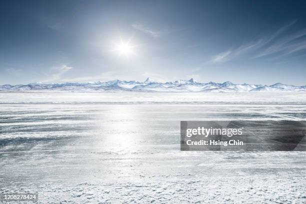 snow mountain road in tibet - frozen lake stock pictures, royalty-free photos & images