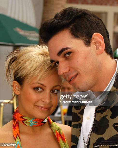 Nicole Richie and boyfriend Adam "DJ AM" during "The Simple Life 2": Nicole Richie Hosts Dog Fashion Show at Hollywood and Highland in Hollywood,...