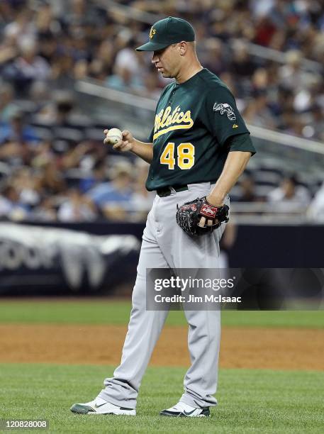 Michael Wuertz of the Oakland Athletics in action against the New York Yankees on July 22, 2011 at Yankee Stadium in the Bronx borough of New York...