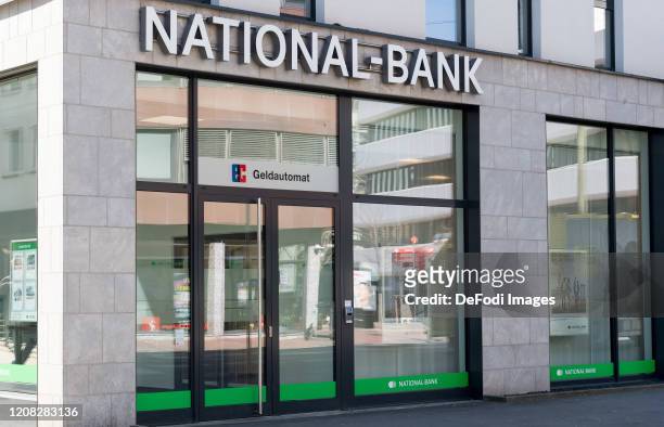 The logo of National-Bank is seen on the facade of a National-Bank branch on March 24, 2020 in Dortmund, Germany.
