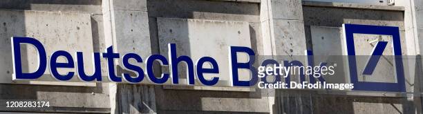The logo of Deutsche Bank is seen on the facade of a Deutsche Bank branch on March 24, 2020 in Dortmund, Germany.