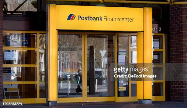The logo of Postbank is seen on the facade of a Postbank branch on March 24, 2020 in Dortmund, Germany.