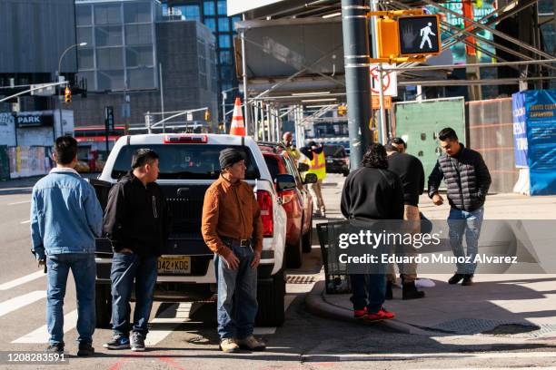 People wait to get an interview for job in a construction on March 26, 2020 in New York City, New York. At least 3.3 million people applied for...