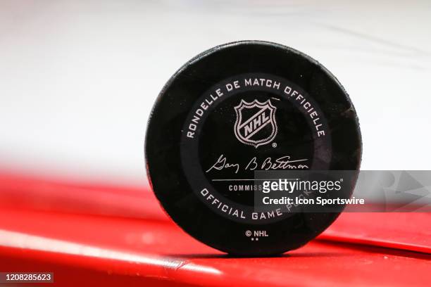 General view of a game puck that was hit into the stands is seen during a regular season NHL hockey game between the Carolina Hurricanes and the...