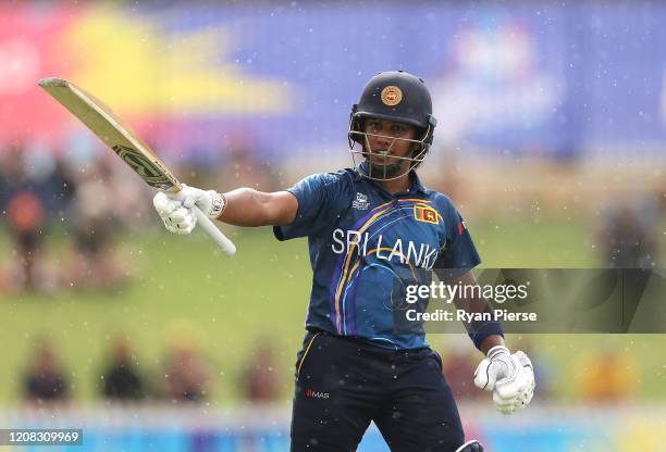 Chamari Athapaththu of Sri Lanka celebrates after reaching her half century during the ICC Women's T20 Cricket World Cup match between Australia and...