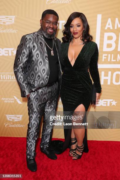 Lil Rel Howery and Melyssa Ford attend American Black Film Festival Honors Awards Ceremony at The Beverly Hilton Hotel on February 23, 2020 in...