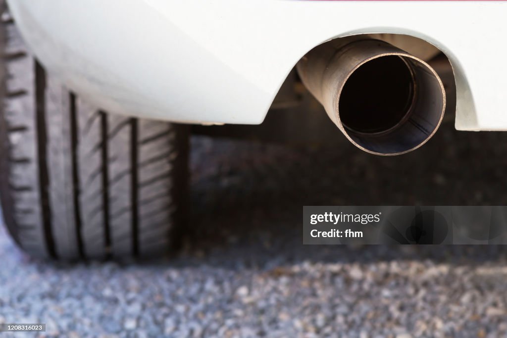 Exhaust pipe at a car (Berlin, Germany)
