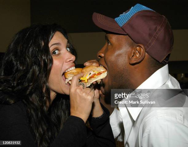 Lisa Donahue and Marcellas Reynolds share a sandwich