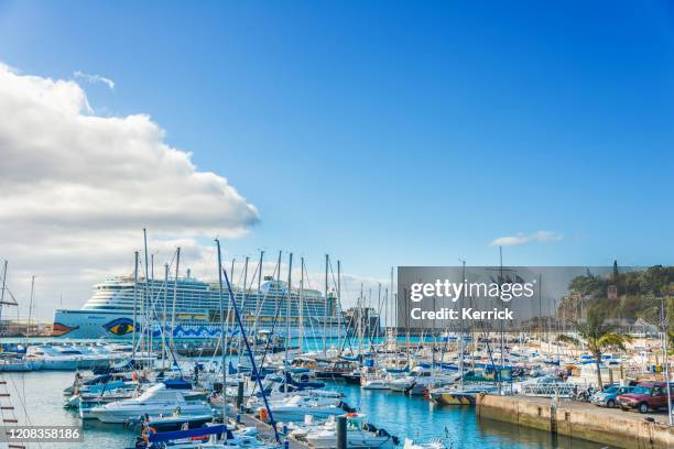 aida prima cruise ship in funchal harbor - madeira, portugal - aida prima stock pictures, royalty-free photos & images