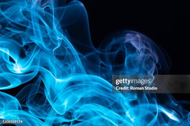 colorful steam on a black background. vaporizer smoke. abstract background. - vape cigarette stock pictures, royalty-free photos & images