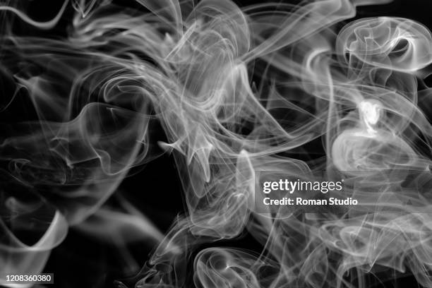 white steam on a black background. vaporizer smoke. abstract background. bw photo - electronic cigarette smoke 個照片及圖片檔