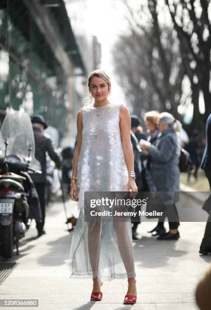 Nina Suess is seen wearing a Louis Vuitton shades before Emporio Armani during Milan Fashion Week Fall/Winter 2020-2021 on February 21, 2020 in...