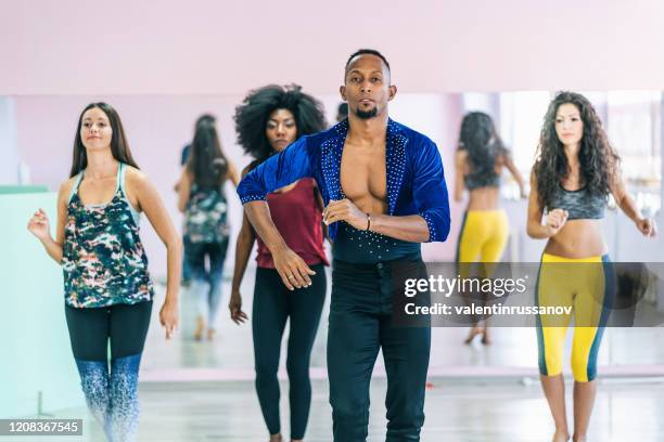 salsa class in a dance studio - salsa dance class stock pictures, royalty-free photos & images