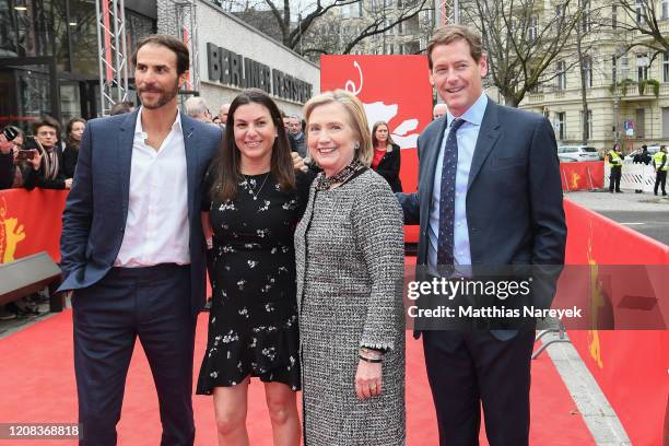 Ben Silverman, Nanette Burstein, former First Lady Hillary Rodham Clinton and Howard Owens pose at the "Hillary" premiere during the 70th Berlinale...