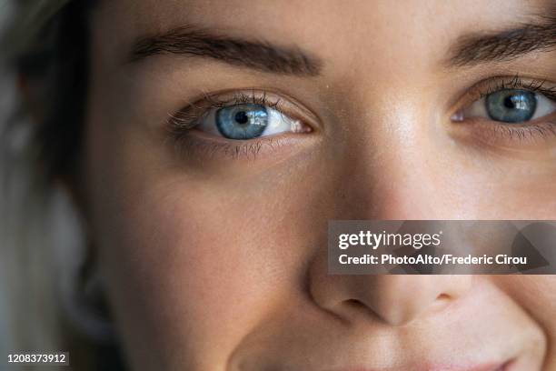 portrait of young woman - human eye foto e immagini stock