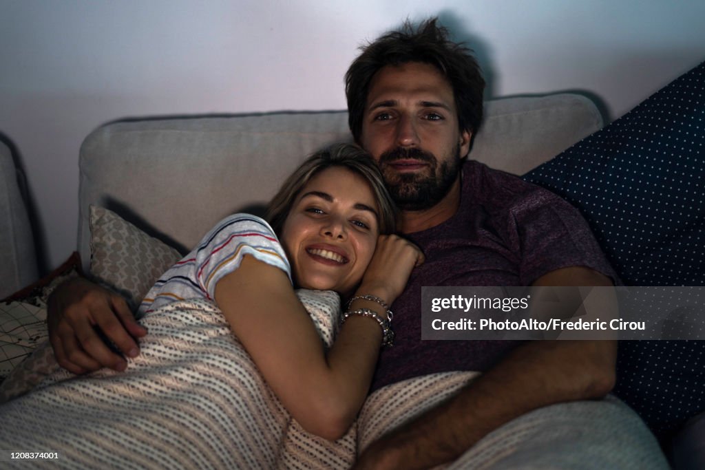 Young couple relaxing at home