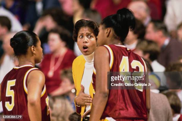Coach and former player of the USC Trojans, women's basketball team, Cheryl Miller, gives instructions during a game against Stanford Cardinal at...