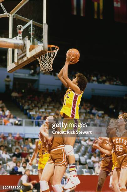 American basketball player Cheryl Miller of USC Trojans takes a shot during a match against the Texas Longhorns, in Los Angeles, California, January...
