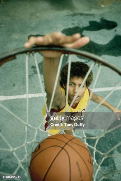 American basketball player Cheryl Miller of USC Trojans, performing a slam dunk, October 1983.
