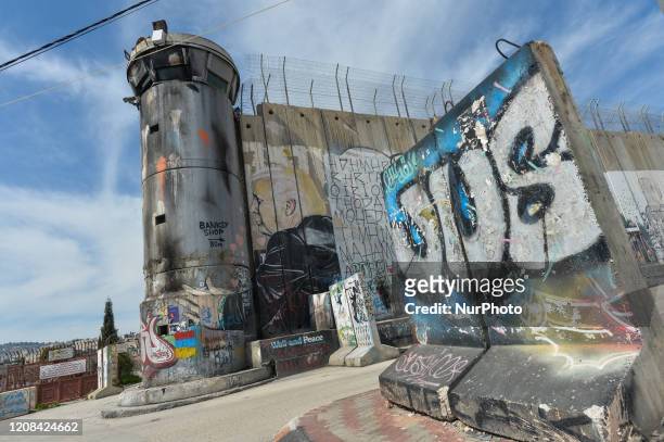 An Image of the US President Donald Trump among other political and social mural paintings and graffitis on the wall separting Israel and the West...