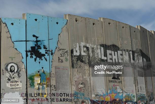 Political and social mural paintings and graffitis on the wall separting Israel and the West Bank in Bethlehem. On Thursday, March 5 in Bethlehem,...