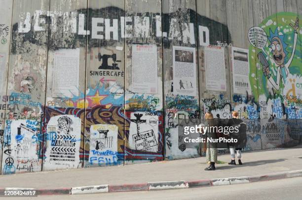 Political and social mural paintings and graffitis on the wall separting Israel and the West Bank in Bethlehem. On Thursday, March 5 in Bethlehem,...