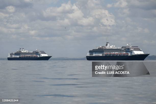 The Zaandam cruise ship enters the Panama City Bay to be assisted by the Rotterdam cruise ship with supplies, personnel and COVID-19 testing devices,...