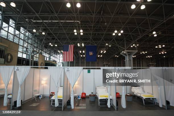 Temporary hospital is set up at the Jacob K. Javits Center on March 27, 2020 in New York. - The New York National Guard, the US Army Corps of...