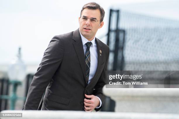 Rep. Justin Amash, I-Mich., is seen on the House steps of the Capitol before the House passed a $2 trillion coronavirus aid package by voice vote on...