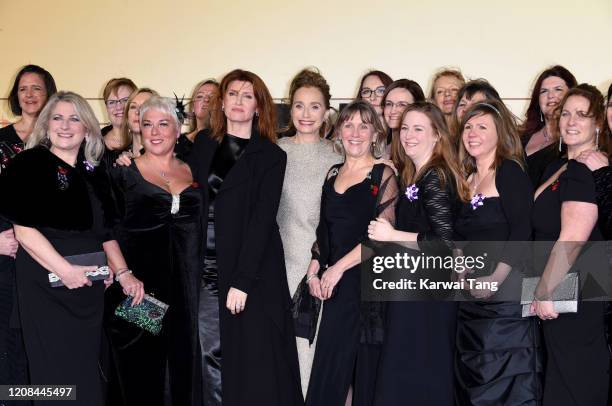 Sharon Horgan and Kristin Scott Thomas attend the "Military Wives" UK Premiere at Cineworld Leicester Square on February 24, 2020 in London, England.