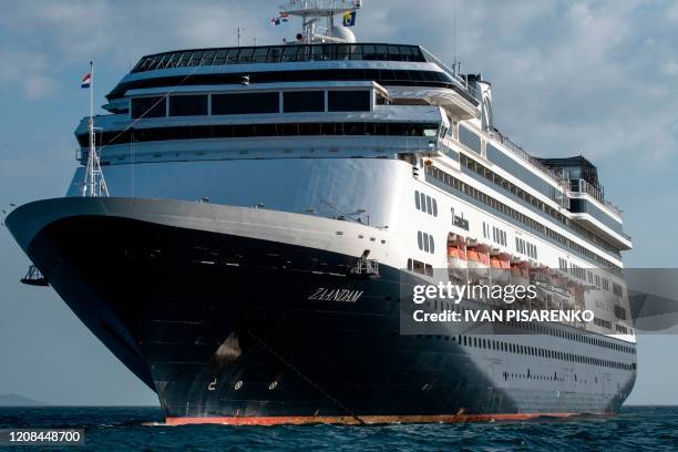 View of Holland America's cruise ship Zaandam as it entered the Panama City bay to be assisted by the Rotterdam cruise ship with supplies, personnel...