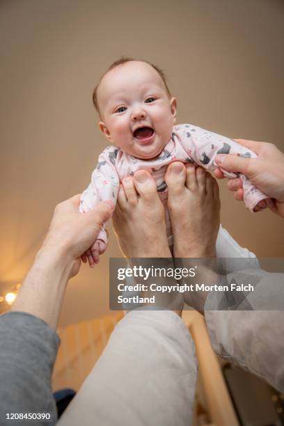 Baby Grabbing Feet Photos And Premium High Res Pictures Getty Images baby-grabbing-feet-photos-and-premium-high-res-pictures-getty-images
