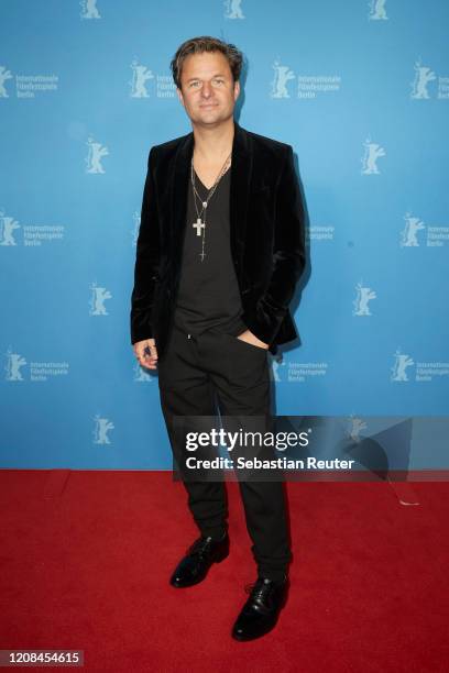 Philipp Hochmair pose at the Netflix premiere of "Freud" during the 70th Berlinale International Film Festival Berlin at Zoo Palast on February 24,...