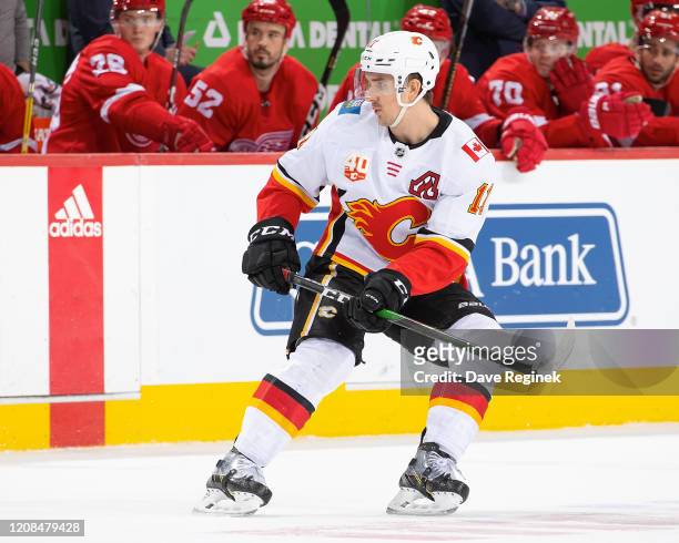 Mikael Backlund of the Calgary Flames follows the play against the Detroit Red Wings during an NHL game at Little Caesars Arena on February 23, 2020...
