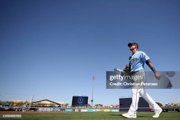 Tim Lopes of the Seattle Mariners arrives to the MLB spring training game against the Chicago Cubs at Peoria Stadium on February 24, 2020 in Peoria,...