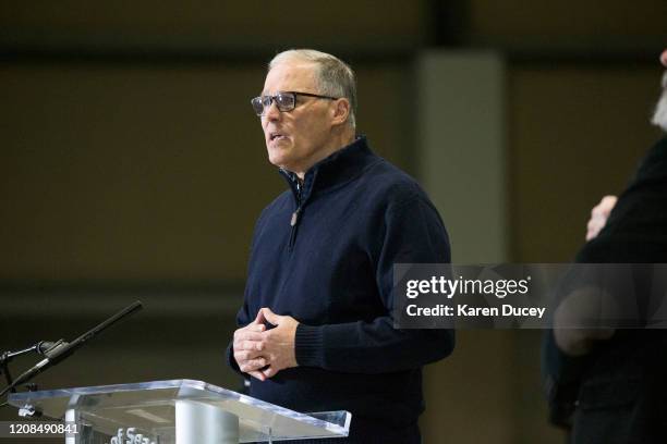 Washington State Governor Jay Inslee and other leaders speak to the press on March 28, 2020 in Seattle, Washington. The governor discussed deployment...