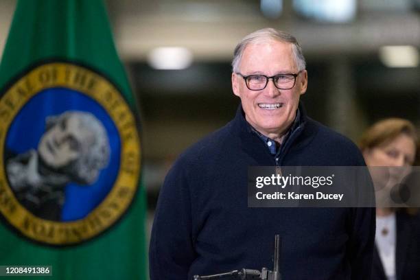 Washington State Governor Jay Inslee and other leaders speak to the press on March 28, 2020 in Seattle, Washington. The governor discussed deployment...