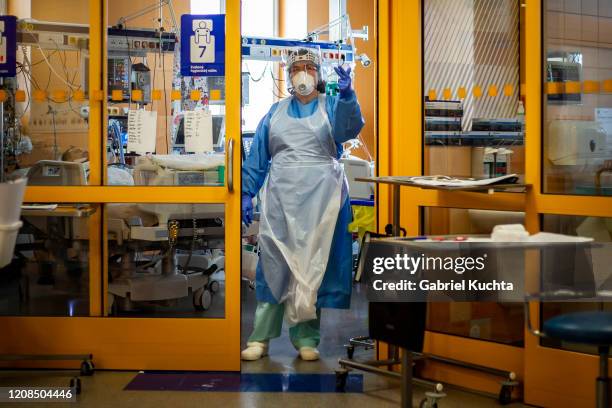 Doctor wearing protective gear during her shift in the intensive care unit of the General University Hospital where patients infected with...