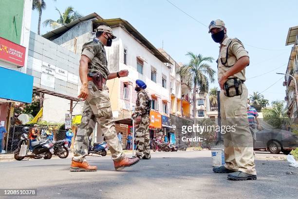 Paramilitary soldiers patrol along a street during a government-imposed nationwide lockdown as a preventive measure against the COVID-19 coronavirus...